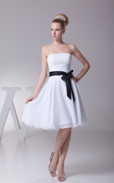 Knee Length Ruched Sleeveless A-Line Gown With Bowed Sash and Zipper Back