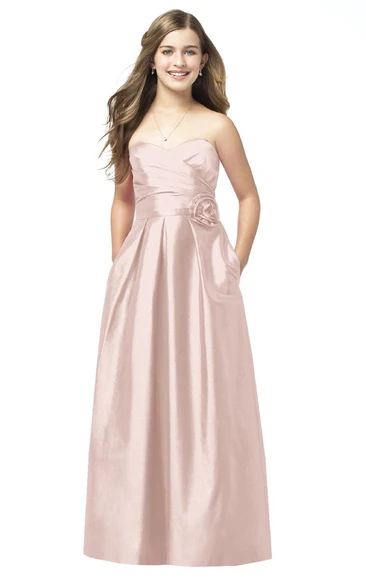 Satin Gown With Crisscross Ruching And Flower