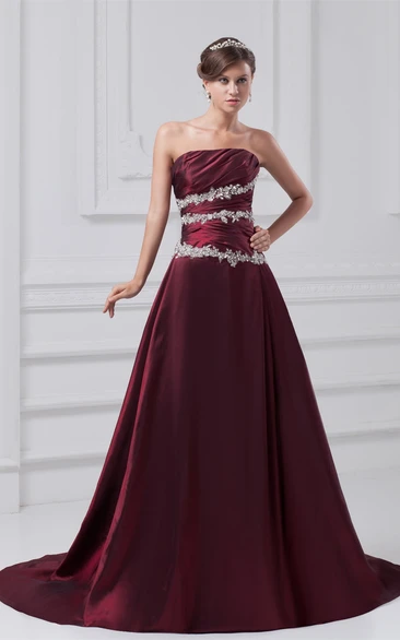 Strapless Appliqued A-Line Gown With Ruched Bodice
