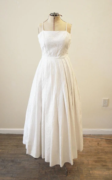 A-Line Lace Bridal Gown With Spaghetti Straps and Pleated Skirt